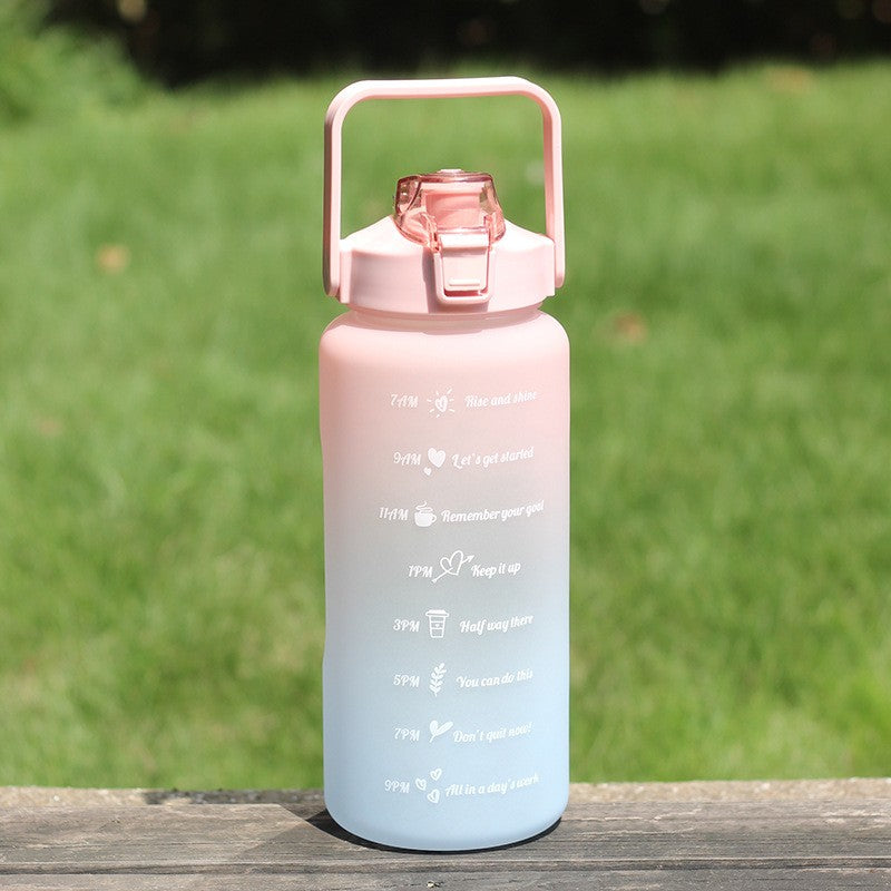 Gradient sports water bottle with 2L capacity, straw and handle, PVC free, lockable lid for climbing and outdoor activities.