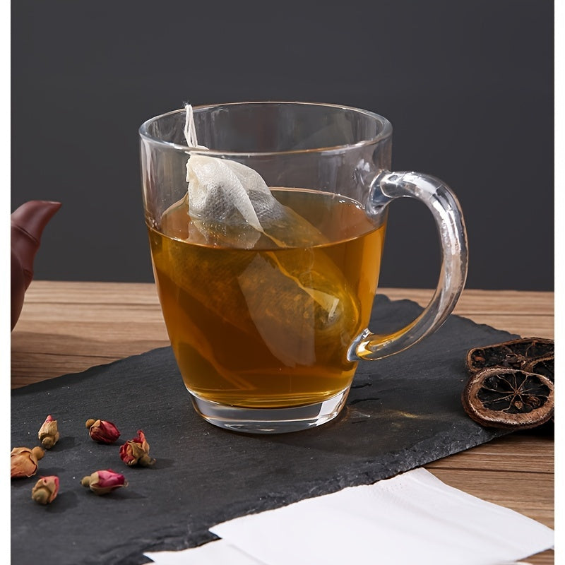 100 pieces of disposable drawstring tea bags made of non-woven material. These food-safe filter bags are perfect for brewing Chinese medicine, seasoning, straining soup, and separating residue.