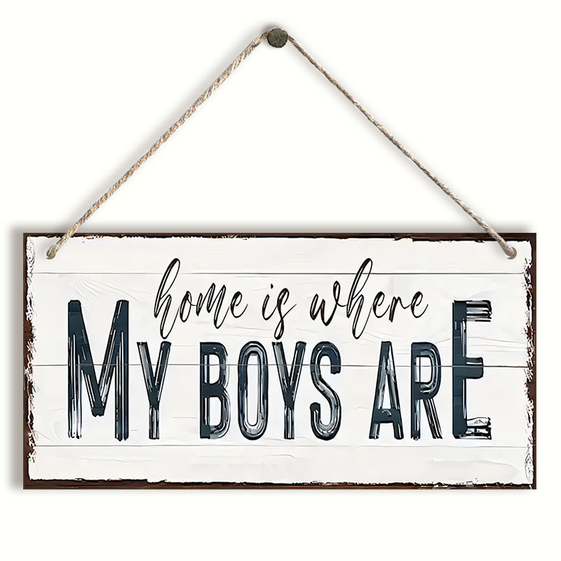 Wooden sign with the words "Home Is Where My Boys Are," a delightful gift idea for a new mom or Mother's Day. This farmhouse-style wall decor is perfect for the bedroom and adds a touch of shabby chic charm. It's a wonderful keepsake and a lovely