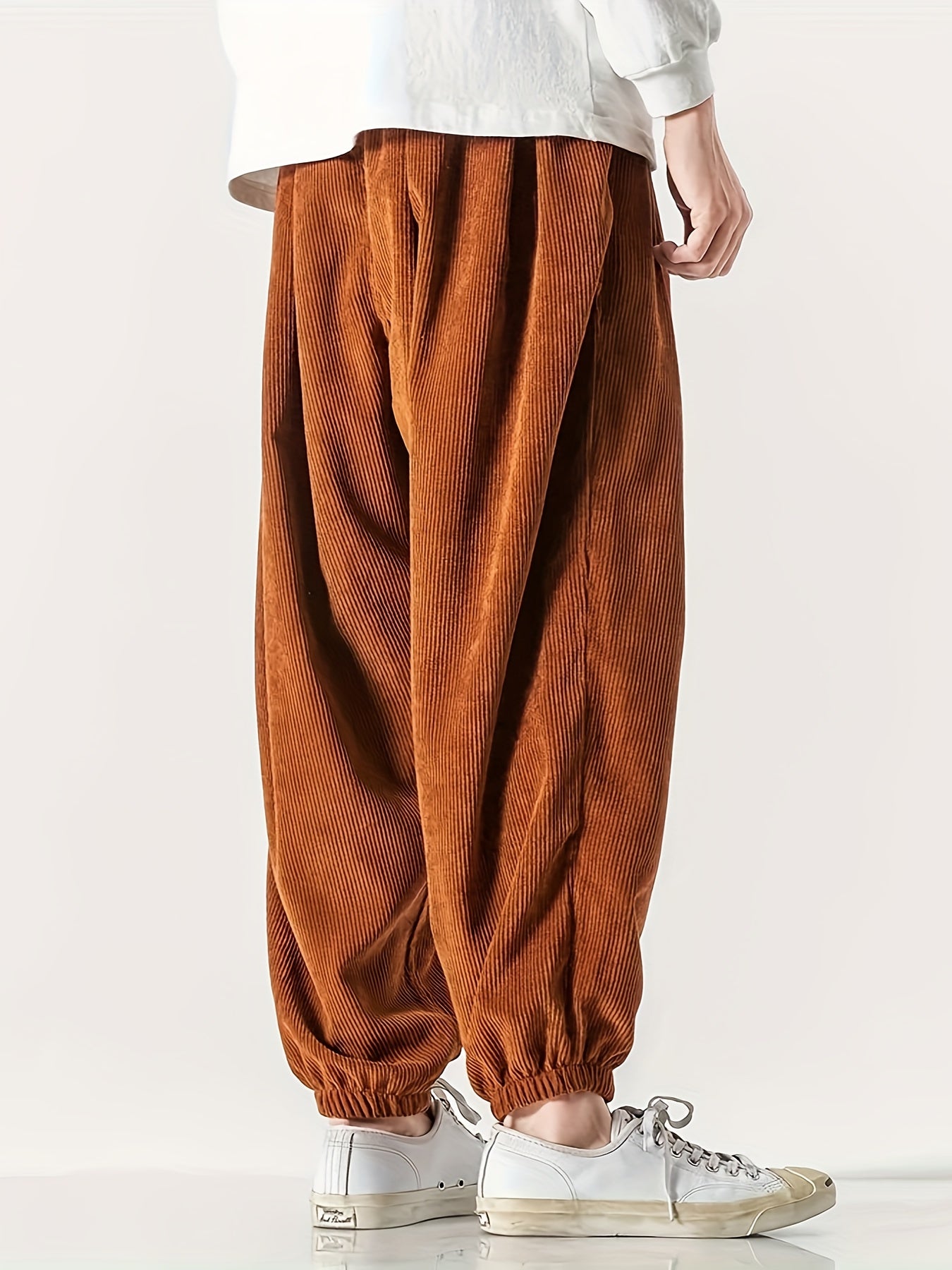 Men's wide leg corduroy pants with drawstring, chic and comfy for spring and fall.