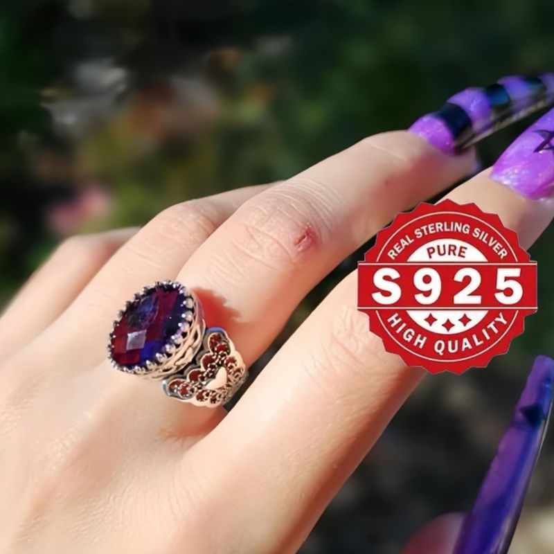 Handmade with care, this stunning cocktail ring features a detailed filigree art heart design and is crafted from 925 sterling silver. Adorned with a beautiful amethyst gemstone, this solid silver ring is perfect for everyday wear.