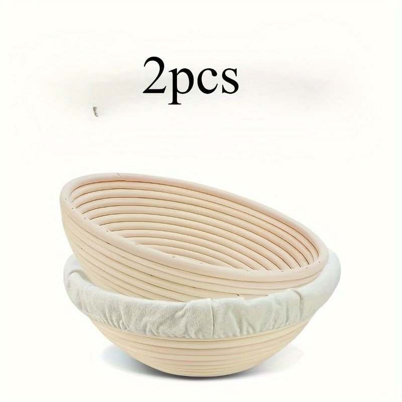 Set of two modern round bread proofing baskets with liners made from rattan. This banneton basket kit is ideal for baking artisan sourdough bread, providing a non-stick fermentation basket for home bakers and bread making.