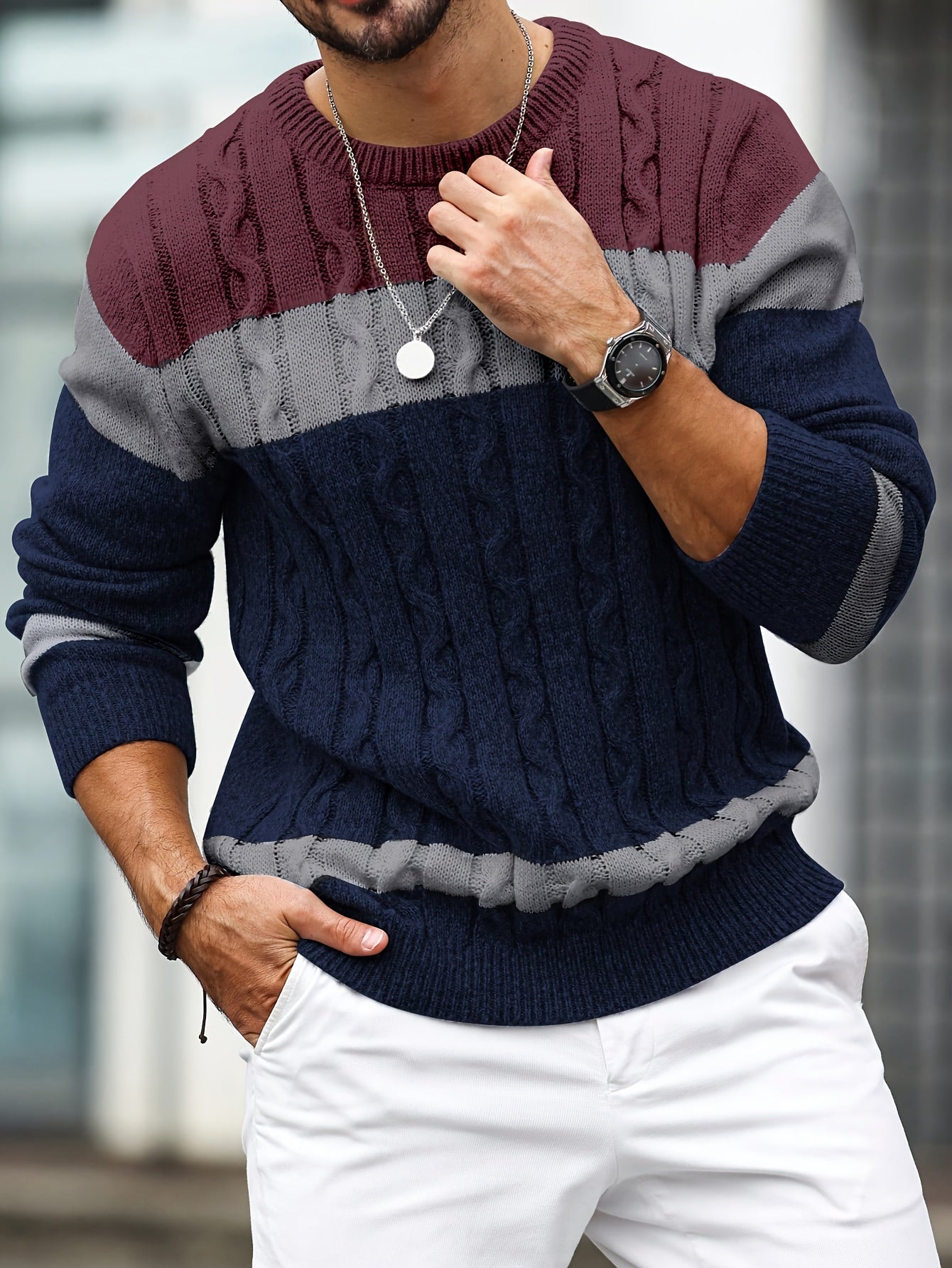 Men's plus size color block sweater with crew neck, perfect for casual street style in fall/winter. Features long sleeves, loose fit, and twist detail.