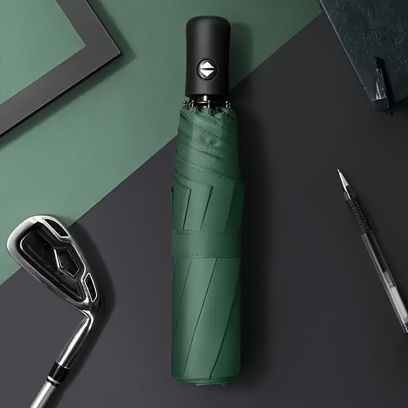 Stylish green compact automatic umbrella with windproof features for outdoor activities and daily use. Made with lightweight materials for easy portability.