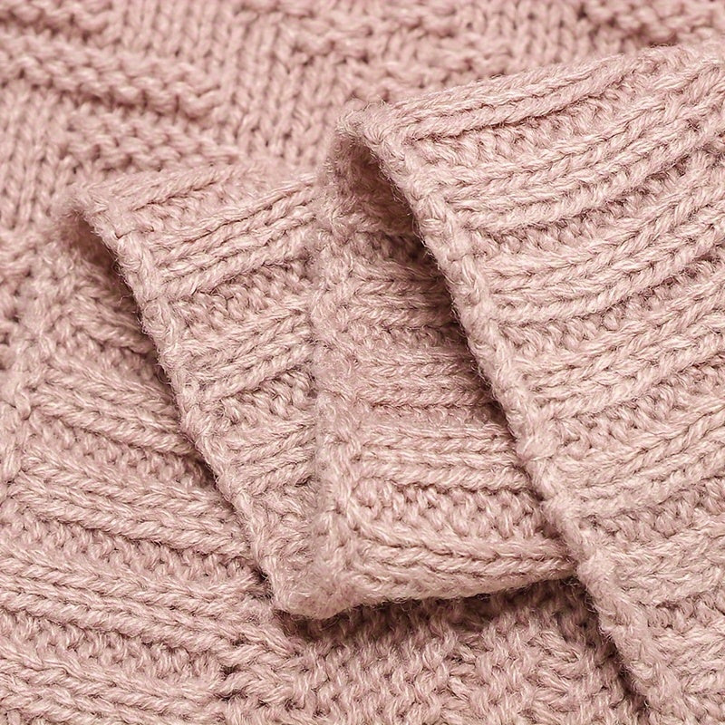 Soft, solid color blanket perfect for home and travel use, hand-knitted with care.