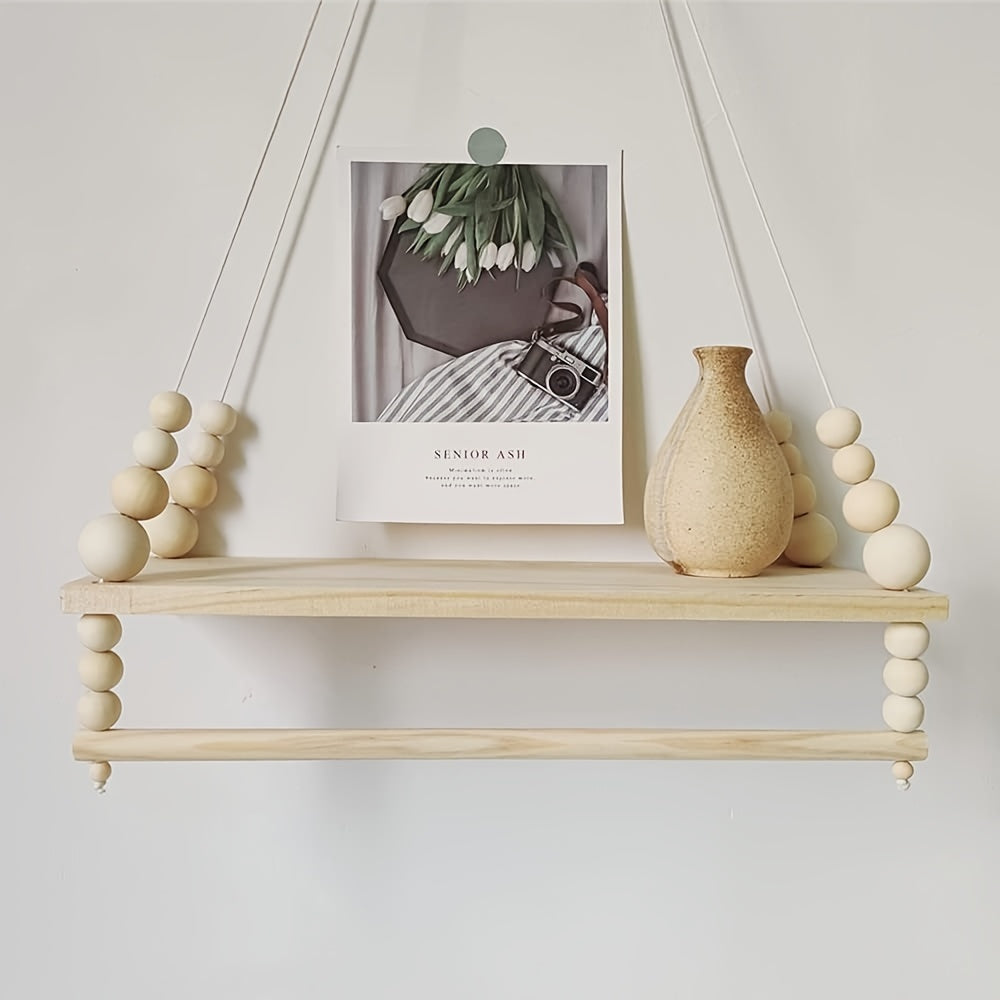 Enhance your home decor with this Bohemian-style wooden hanging shelf organizer! This 1-pack set includes wall-mounted floating shelves with a towel bar, perfect for displaying nursery room items and storing plants. Suitable for use in the living room or