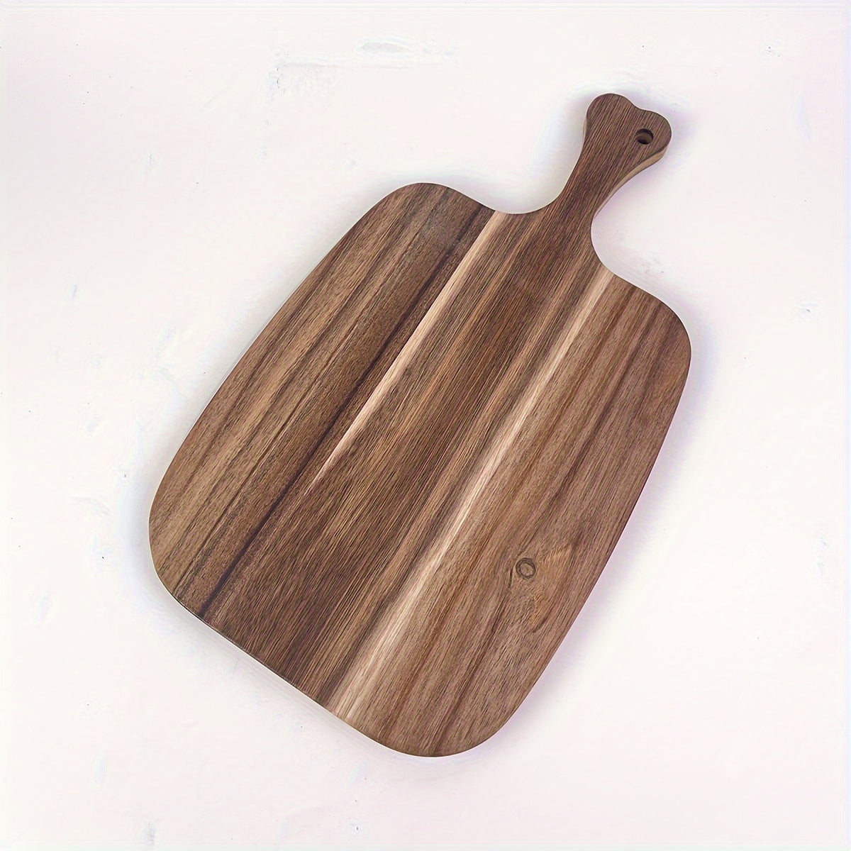 Multi-functional wood cutting board, perfect for chopping cheese, meat, bread, vegetables, and fruits. Features an extra thick design with a handle for easy transport. Durable and easy to clean, ideal for use in homes or dormitories.