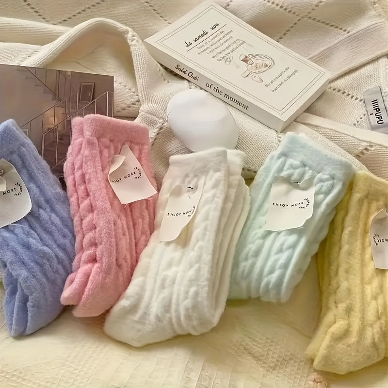 5 pairs of cozy knit socks for women made from a soft and warm blend of polyester (95%) and spandex (5%). Featuring a solid color twist pattern, these mid-calf socks are hand washable and