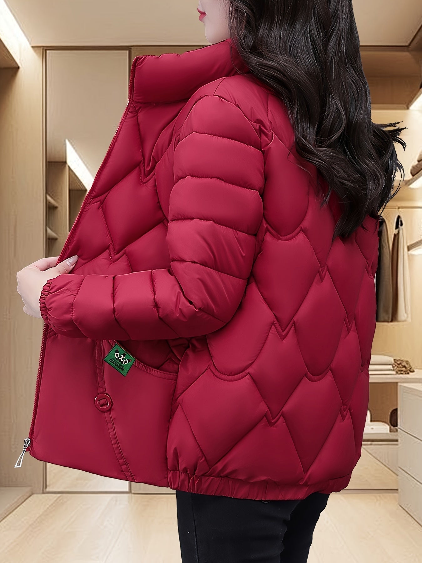 Embroidered quilted jacket for middle-aged moms with pleated hem and thick insulation for warmth.