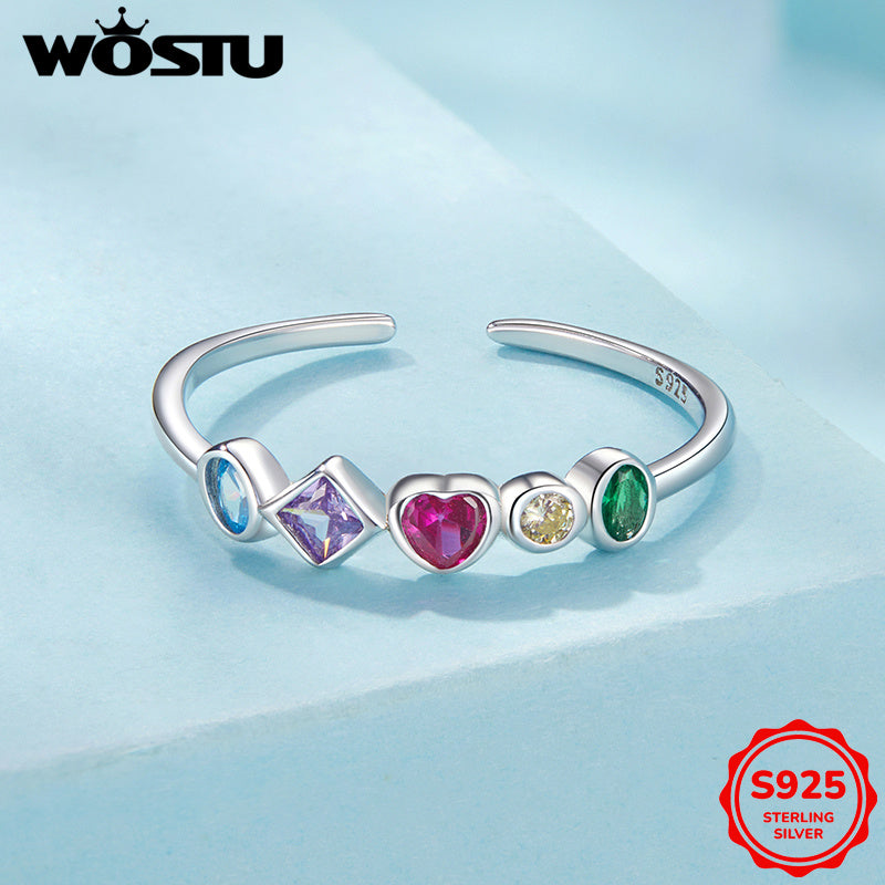 This open ring for women showcases a vibrant heart design reminiscent of Japanese and Korean Y2K styles. Crafted from 925 silver and adorned with synthetic zirconia, it weighs 2.5G. Ideal for daily wear or as a thoughtful gift for a girlfriend, partner