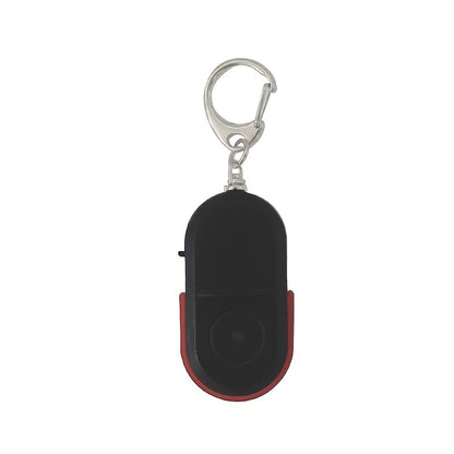 WhistleGuard Anti-Lost Key Finder with LED light and voice control pendant. Battery-operated for travel and daily use.