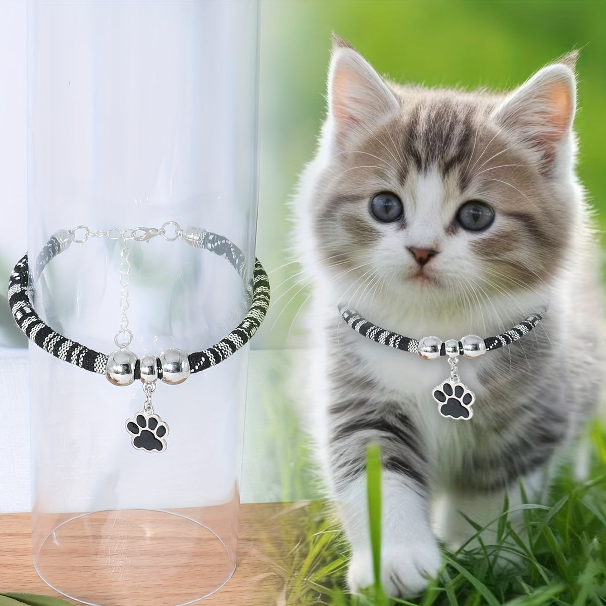 Durable, stylish, adjustable nylon pet necklace with colorful paw print pendant. Suitable for cats and small dogs.