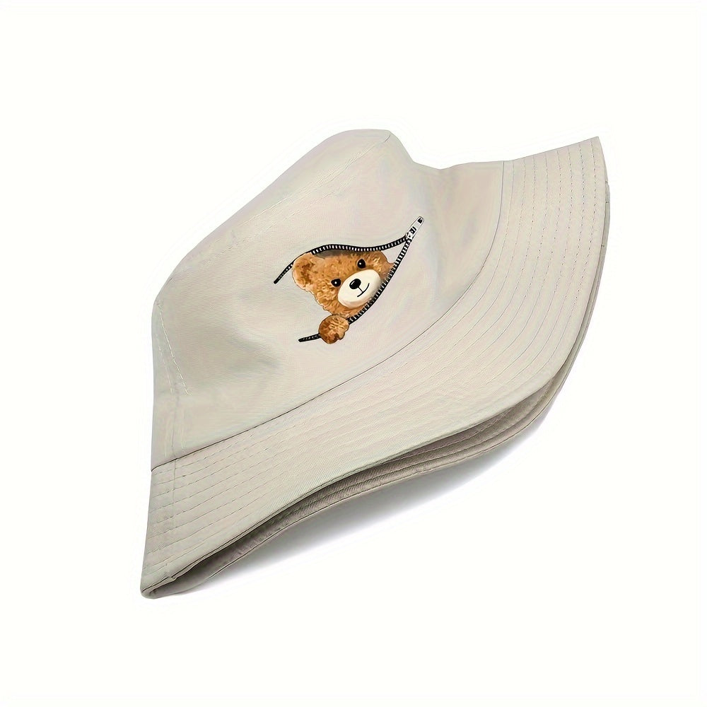 Polyester bucket hat with teddy bear print, ideal for outdoor activities. Made of knitted fabric, hand washable.