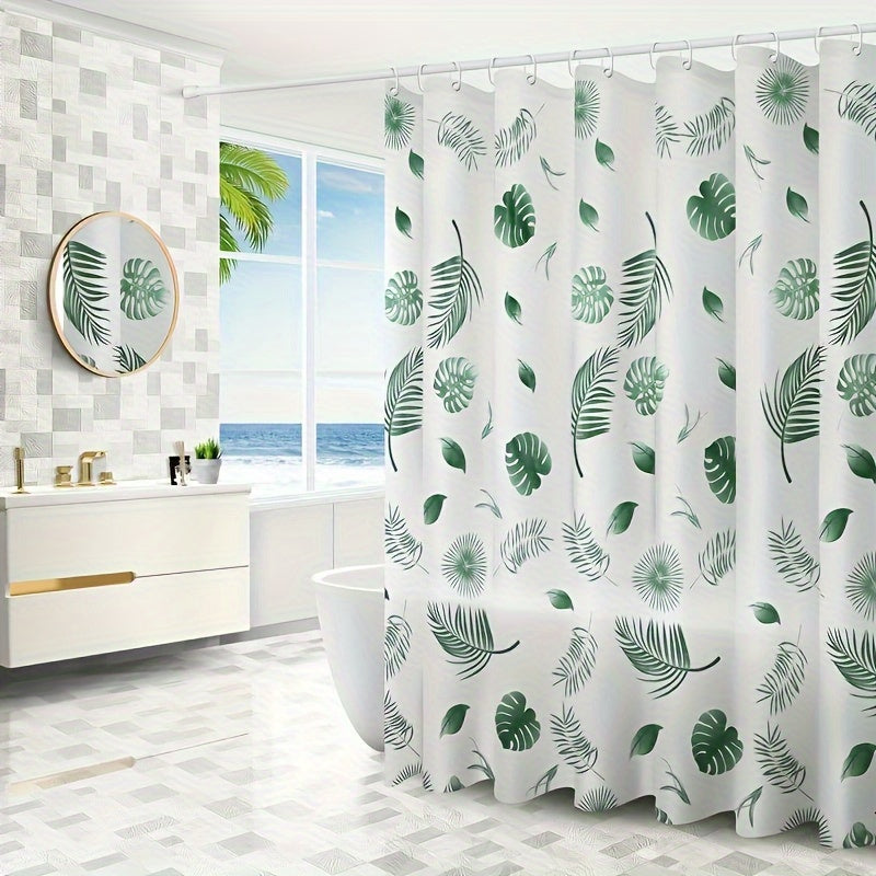 Tropical leaf bath liner made of water-resistant polyethylene, featuring a leaf pattern. Includes easy-hang white plastic hooks for all-season bathroom decor.