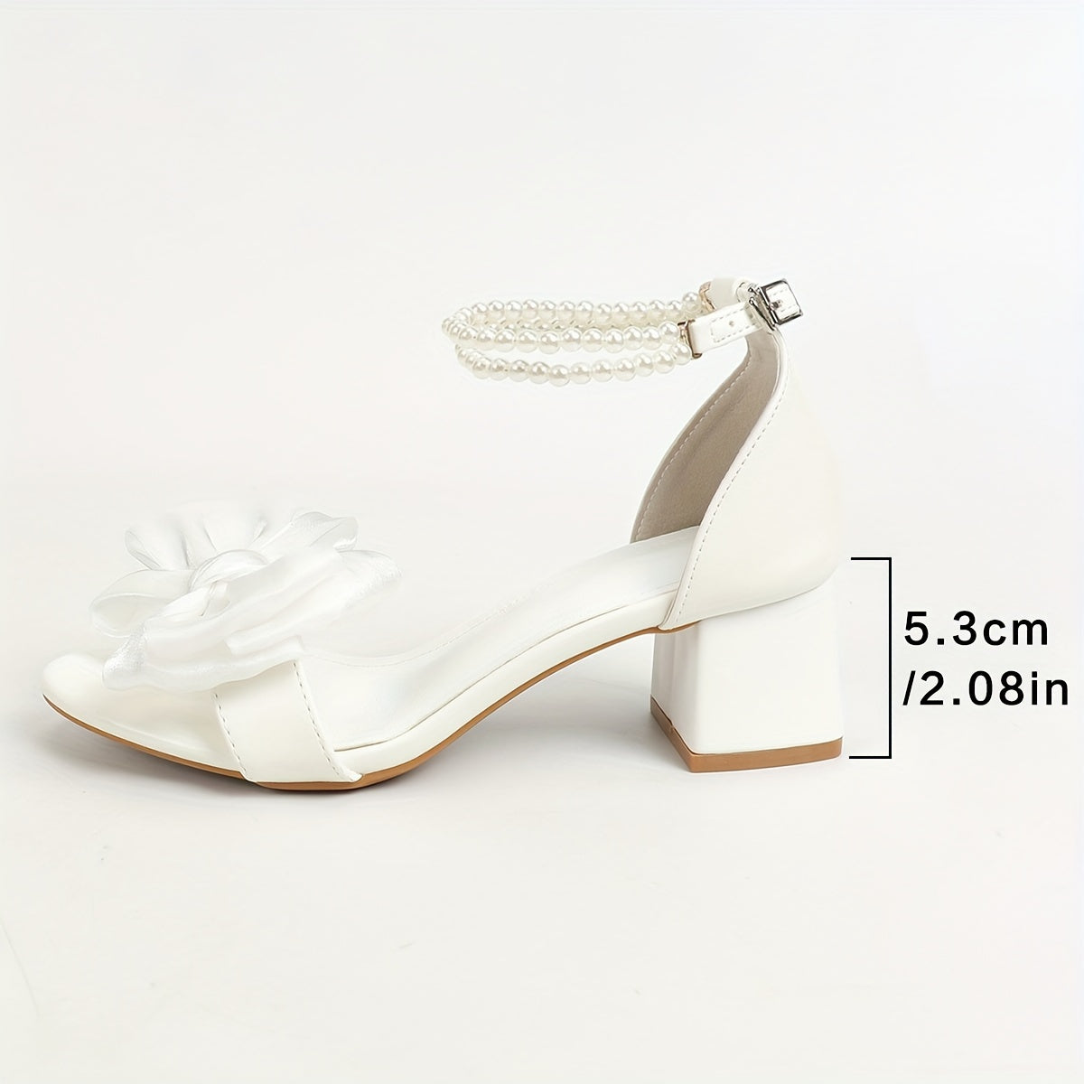 Chunky low heeled sandals with bow decor and faux pearl ankle strap, perfect for evening wear.