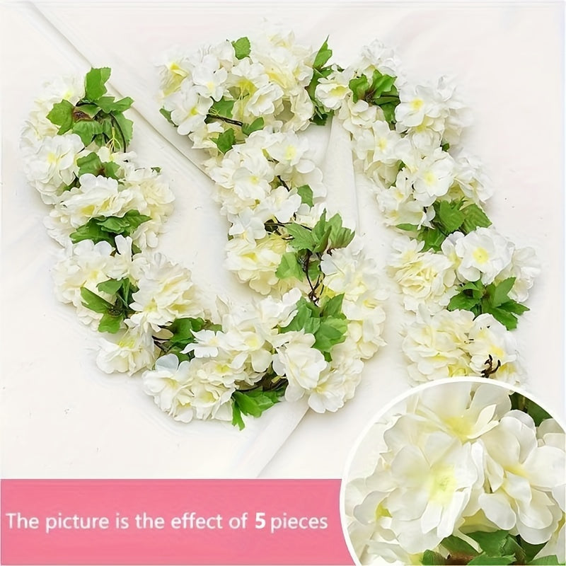 Elegant artificial cherry blossom vine, ideal for home, party, wedding, and garden decor.