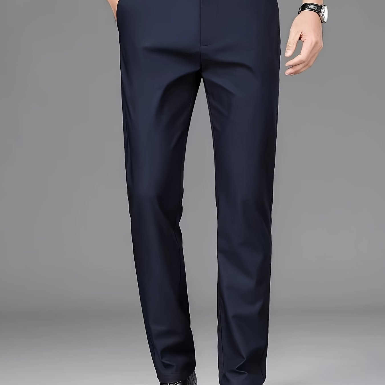 This is a versatile pair of men's straight-leg suit pants suitable for both professional or casual wear during autumn and winter.