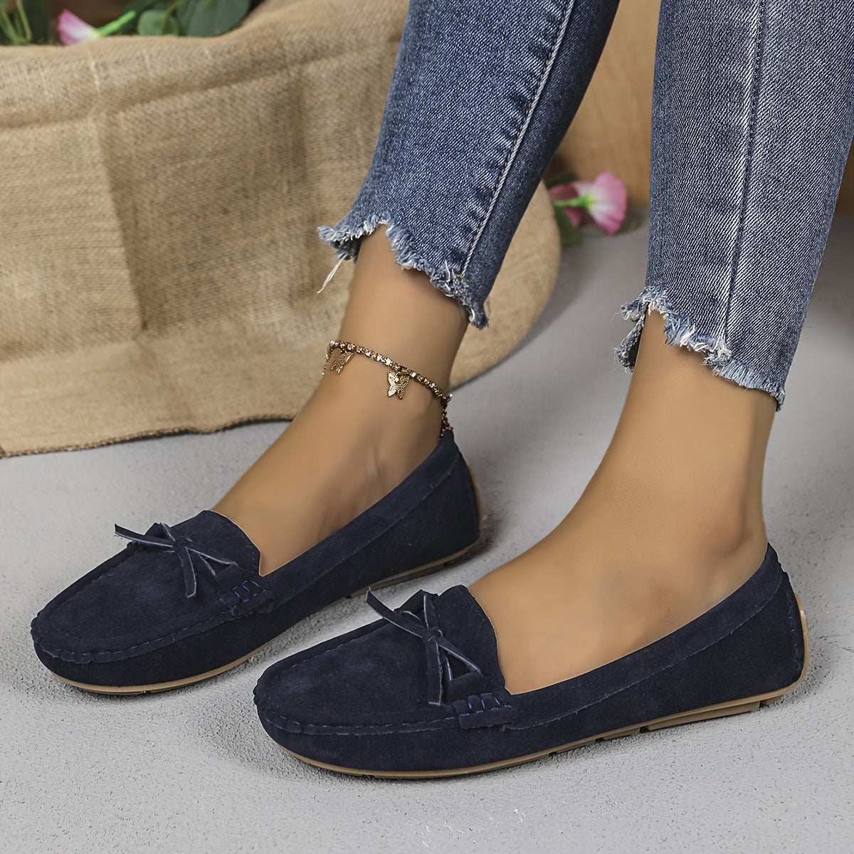 Retro flat loafers with bow detail, slip on style, and soft sole for casual wear.