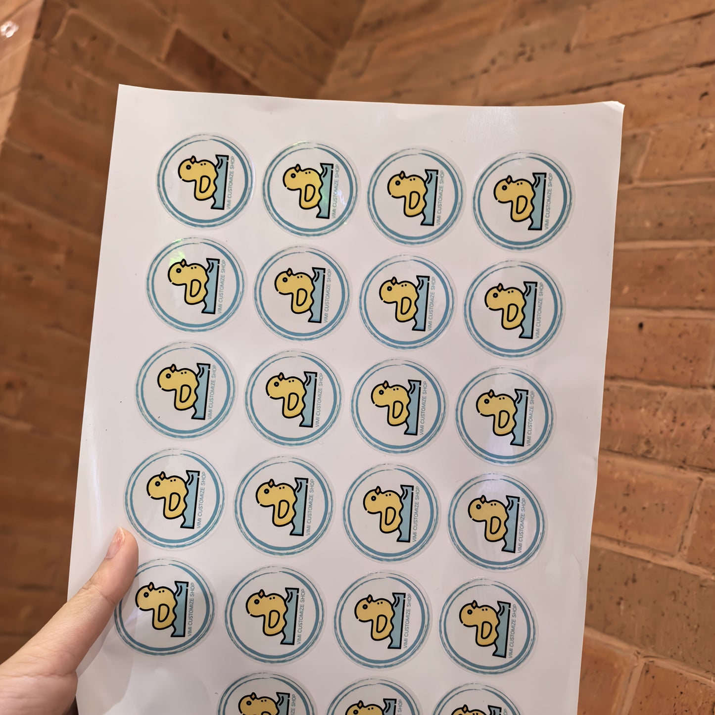 Custom stickers measuring 3.99 cm in size are available in waterproof PVC transparent and white bottom PP paper materials. These stickers can feature your logo, wedding or birthday designs, personalized labels for Christmas and Halloween gifts, or small