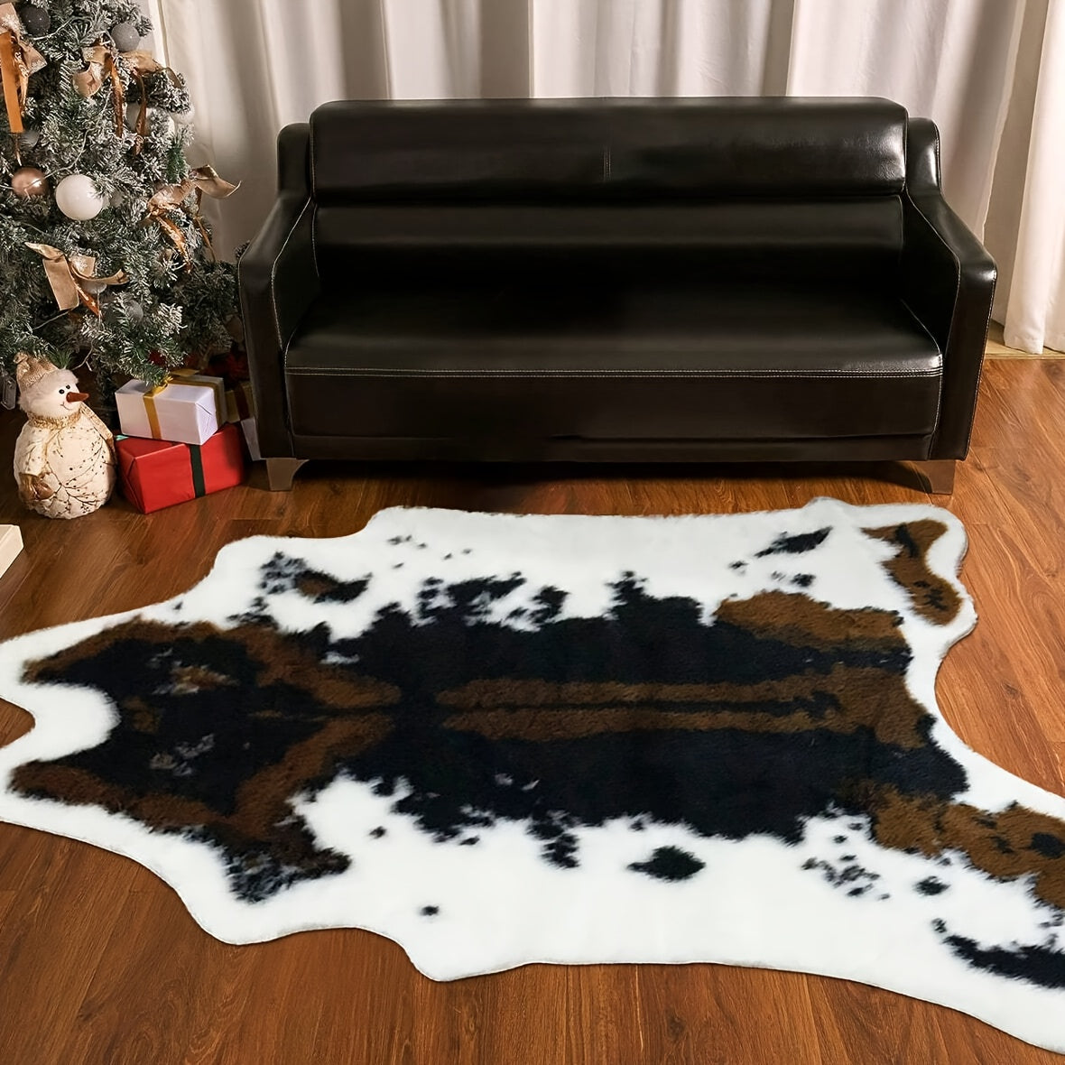 Add a touch of luxury to your space with our 1pc Premium Faux Cowhide Rug. This durable and large size cow print rug is perfect for your bedroom or living room. Made of faux fur, this animal cow hide carpet is easy to maintain with hand washing only.