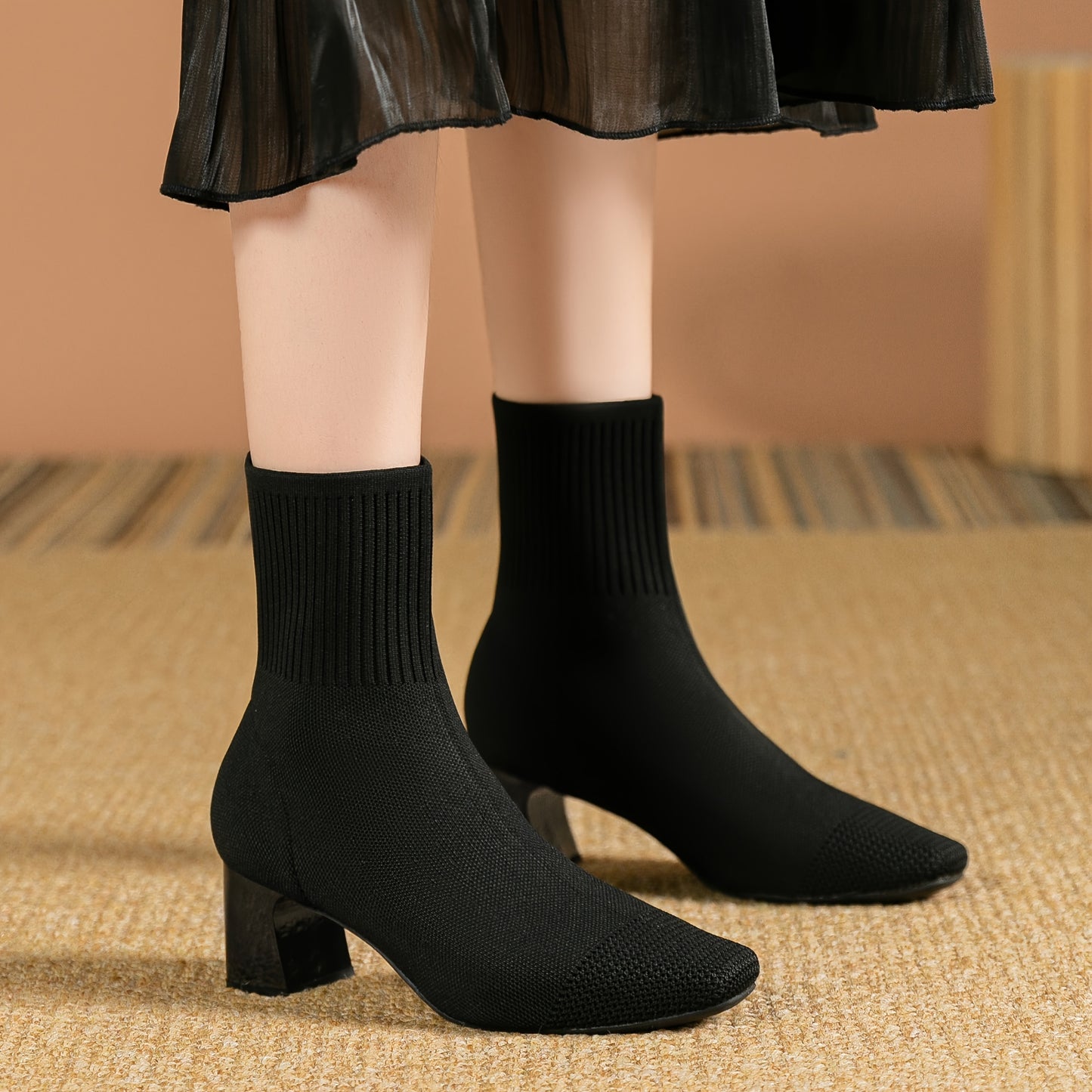 Women's square toe sock boots with high heel, solid color knit design, stretchy slip on style.