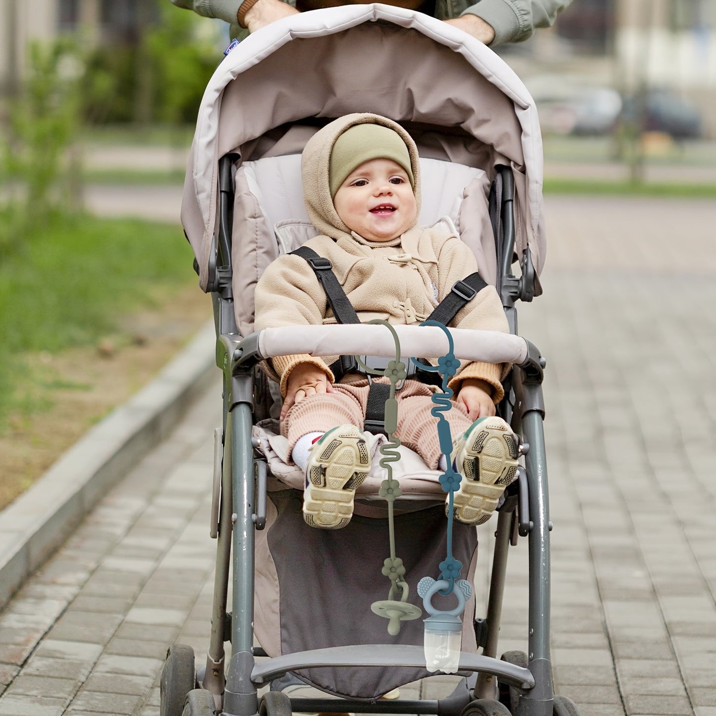 Keep your baby's pacifier secure with this adjustable silicone clip featuring a charming flower design. Suitable for babies 0-3 years old, this universal fit accessory can be attached to strollers, high chairs, car seats, and cribs. Ensure safety with