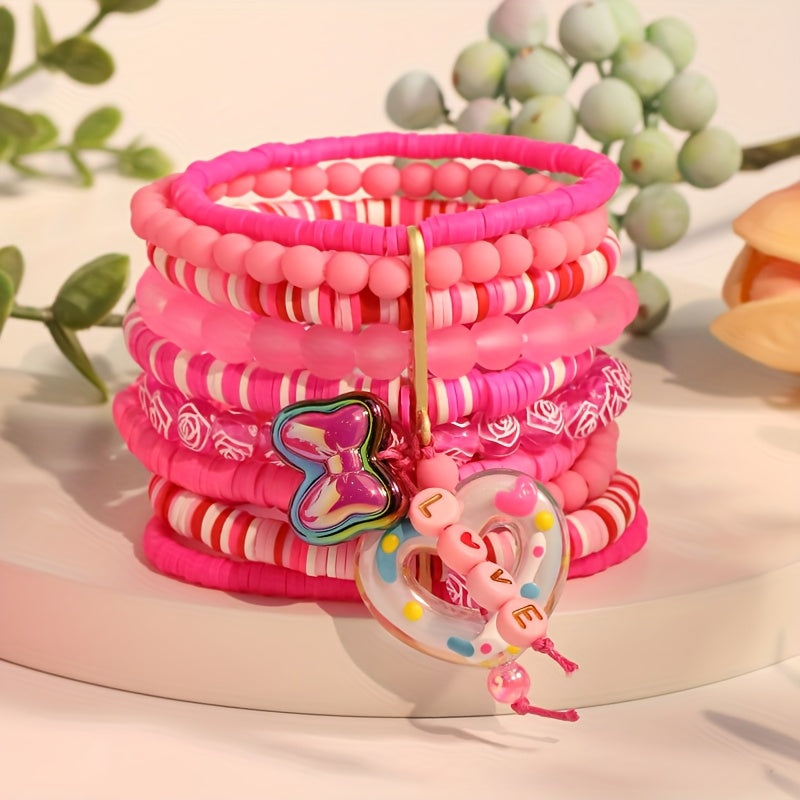 Bohemian-inspired Multi-Layer Pink Resin Beaded Bracelet featuring Heart & Butterfly Charms, a Lovely Pendant Jewelry Piece for Women. Ideal for Valentine's Day, Everyday Wear, or Vacation Style. A Versatile Fashion Accessory for All Seasons.