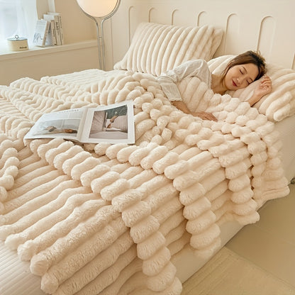 Soft, cozy, machine washable faux rabbit fur throw blanket with luxurious plush feel. Suitable for all seasons, perfect for napping, office, camping, or sofa use.