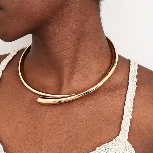 Chic and edgy, this punk-inspired metal choker necklace features an open collar design, perfect for adding some hip hop style to your nightclub look.