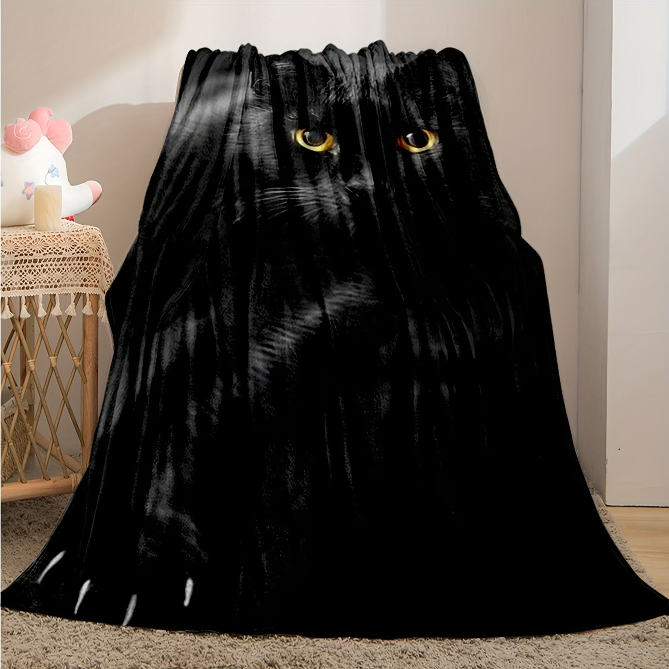 Soft, warm, and stain-resistant, this versatile all-season gift is perfect for adding a cozy touch to any space. Whether you're snuggled up on the couch, in bed, at the office, or on the go, this black cat flannel throw blanket is sure to keep you warm