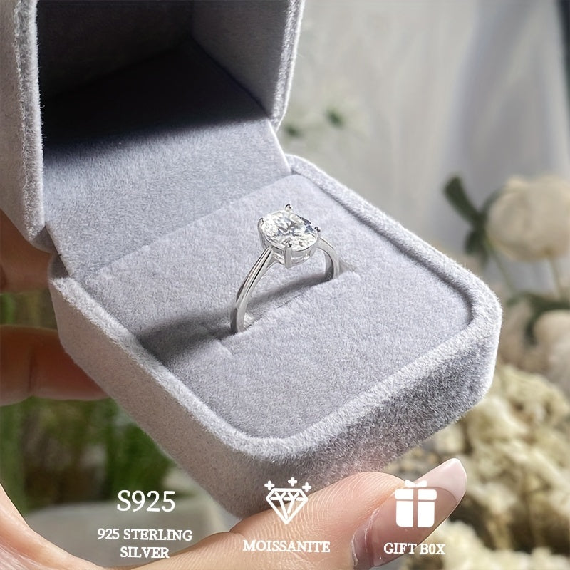 A hypoallergenic wedding or engagement ring gift for women, featuring a 2 carat goose egg Moissanite stone set in a classic four-prong 925 Sterling Silver ring. Includes Moissanite certificate and comes in an exquisite gift box.