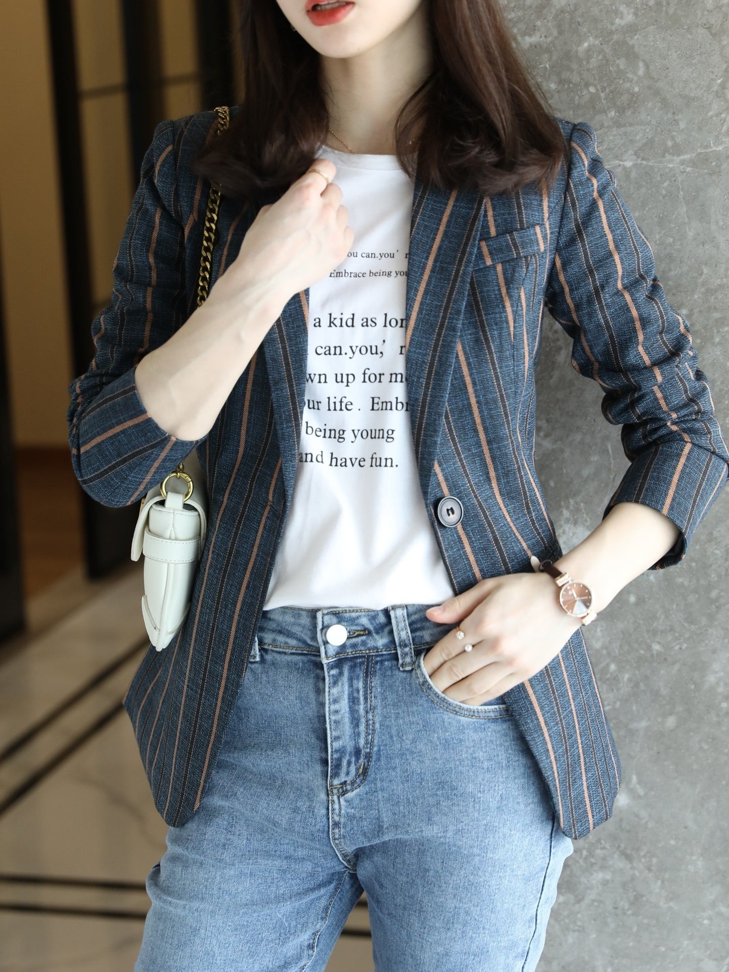 Women's elegant striped blazer with long sleeves and single button closure, made of 97% polyester and 2.7% spandex. Features a regular fit, X-contour design, and woven fabric weighing