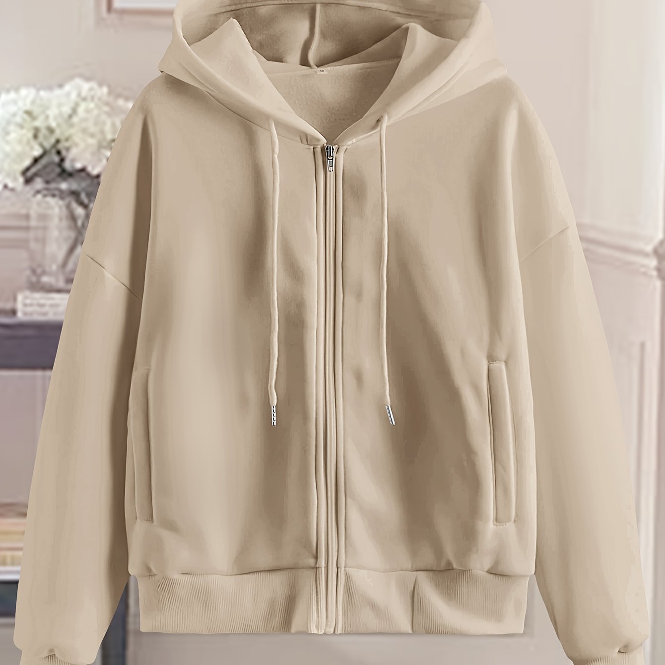 Women's stylish white zip-up hoodie with geometric pattern made of polyester. Machine washable and dry cleanable. Perfect for spring/summer/fall.