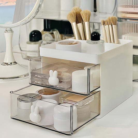 Chic white cosmetic storage box with rabbit handles, 2-drawer desktop organizer for makeup, jewelry, and office supplies. Transparent compartments, lightweight, and easy to assemble. Ideal gift for women.