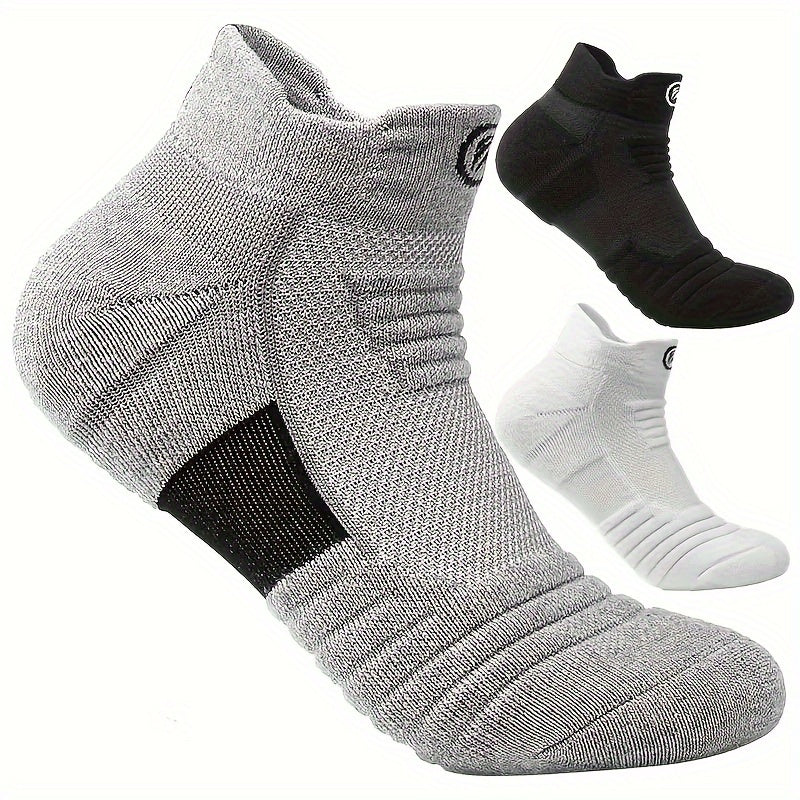 5 pairs of high-performance athletic compression socks for men in gray, black, and white. Made with breathable polyester and sweat-wicking material with a towel bottom, featuring a