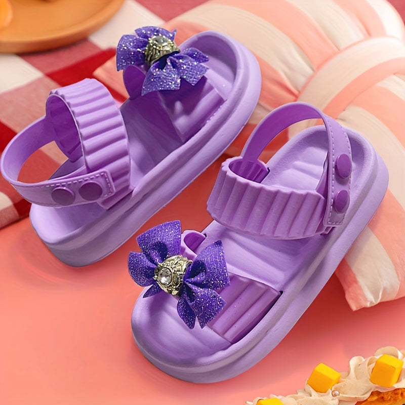 Stylish bowknot sandals for girls, perfect for indoor and outdoor wear.