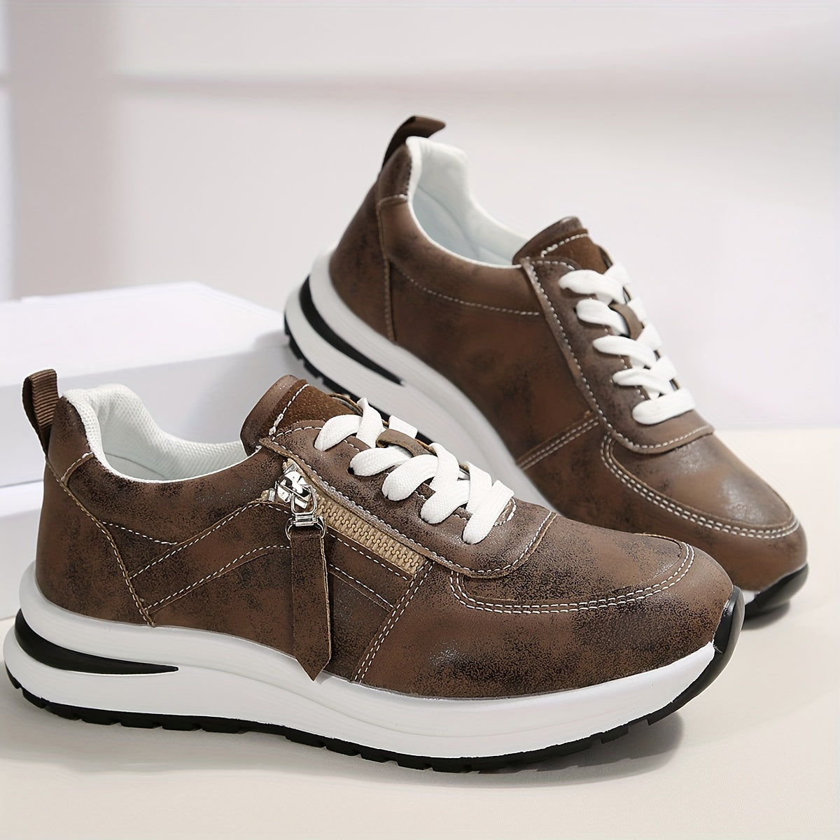 Women's lightweight casual sneakers with lace-up design, low top, round toe, soft fabric lining, and TPR sole.