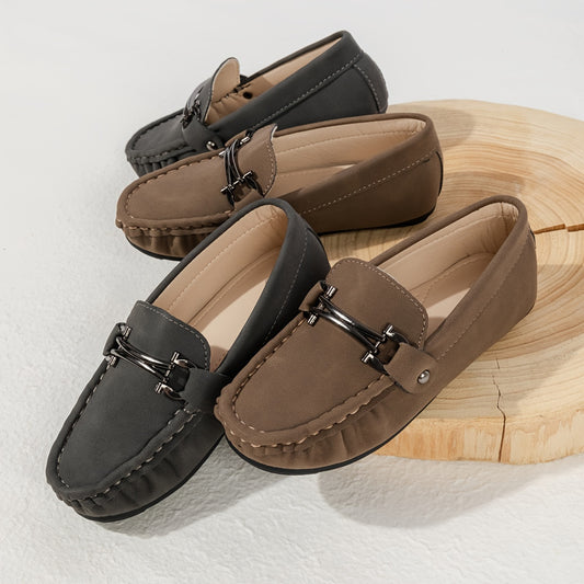 Boys' slip-on loafers in black and brown, suitable for all activities.