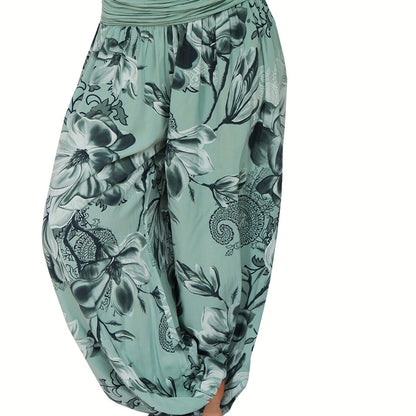 Women's floral print harem pants in blue and white, made of lightweight polyester with wide legs for a casual vacation style. Features a relaxed fit, perfect for machine washing.