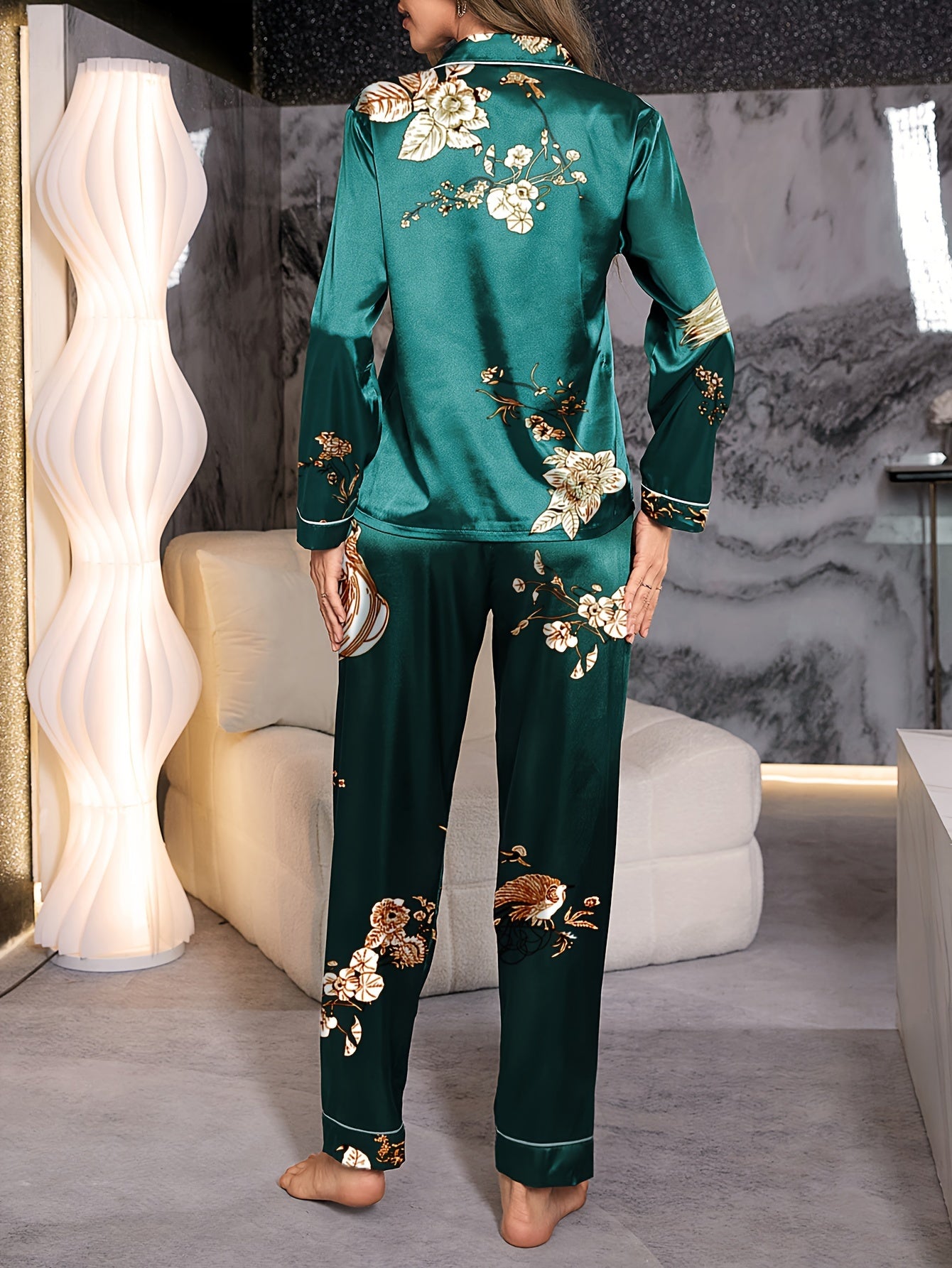 Floral satin pajama set for women, featuring long sleeve top with lapel buttons and matching pants, perfect for a cozy fall look.