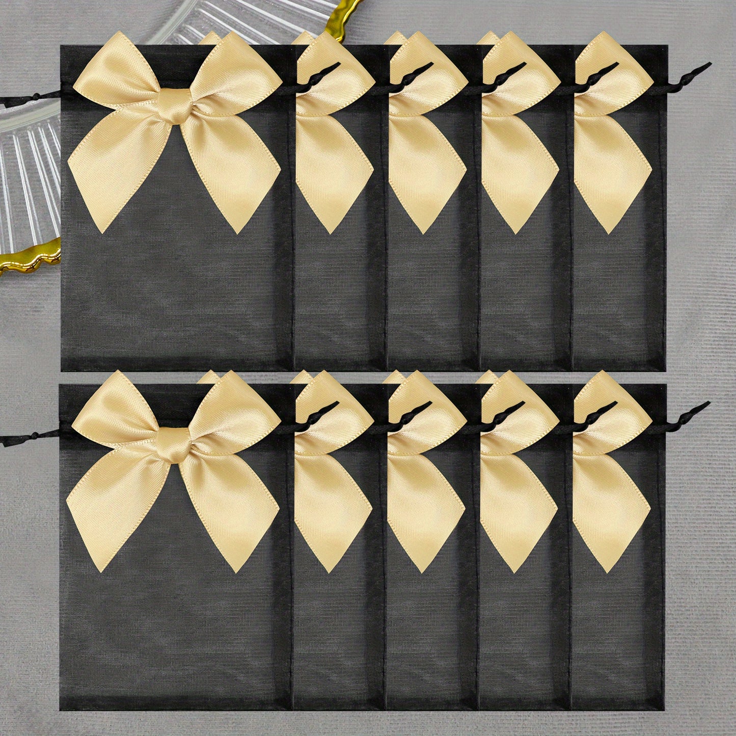 10 elegant organza bags with ribbon and bow, ideal for gift wrapping and party favors.