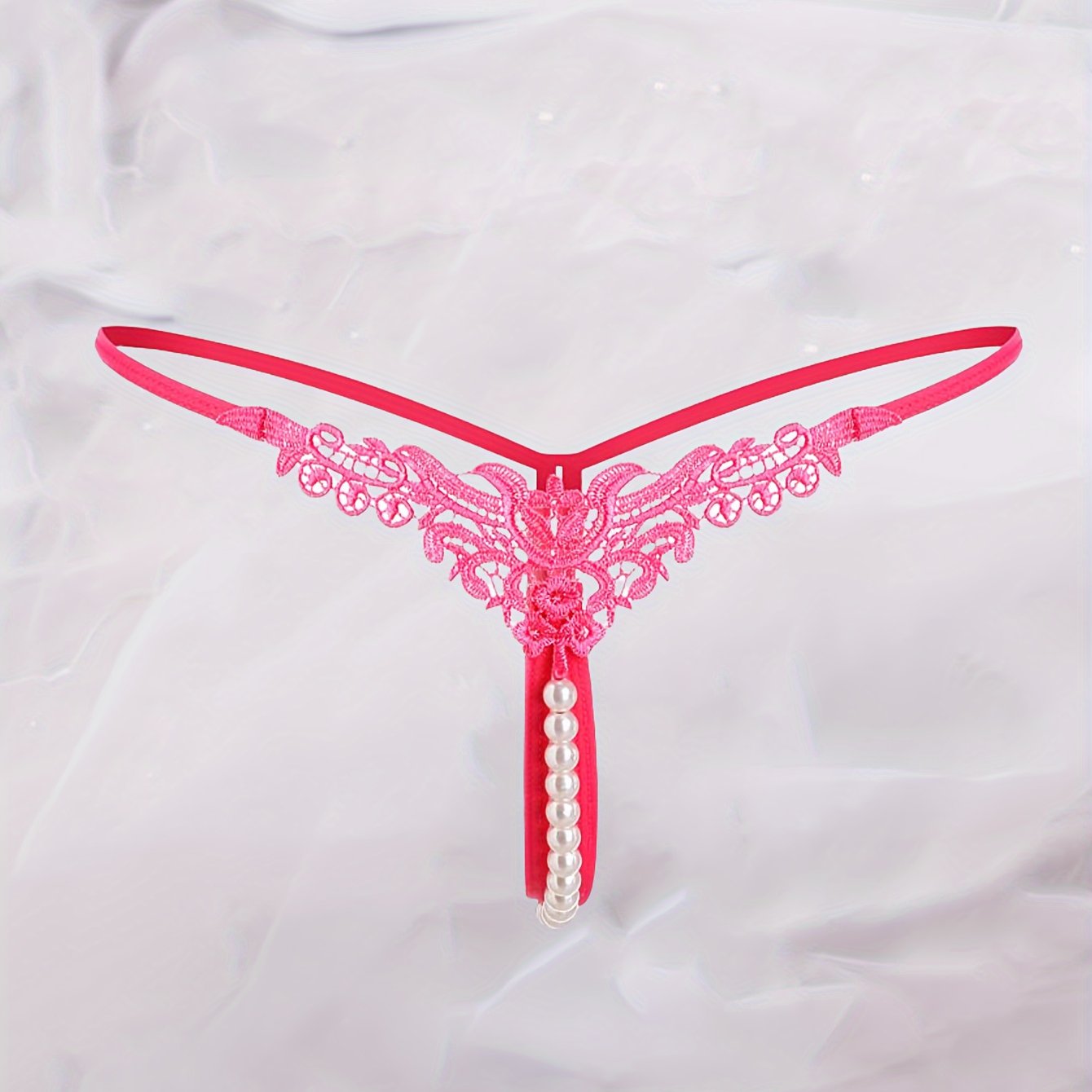 Women's low-rise thong with faux pearl design, sexy lingerie & underwear.