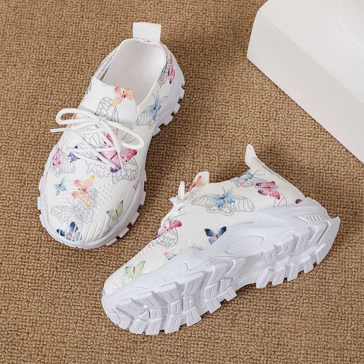 Stylish butterfly patterned running shoes for kids, with comfortable non-slip soles for outdoor sports.