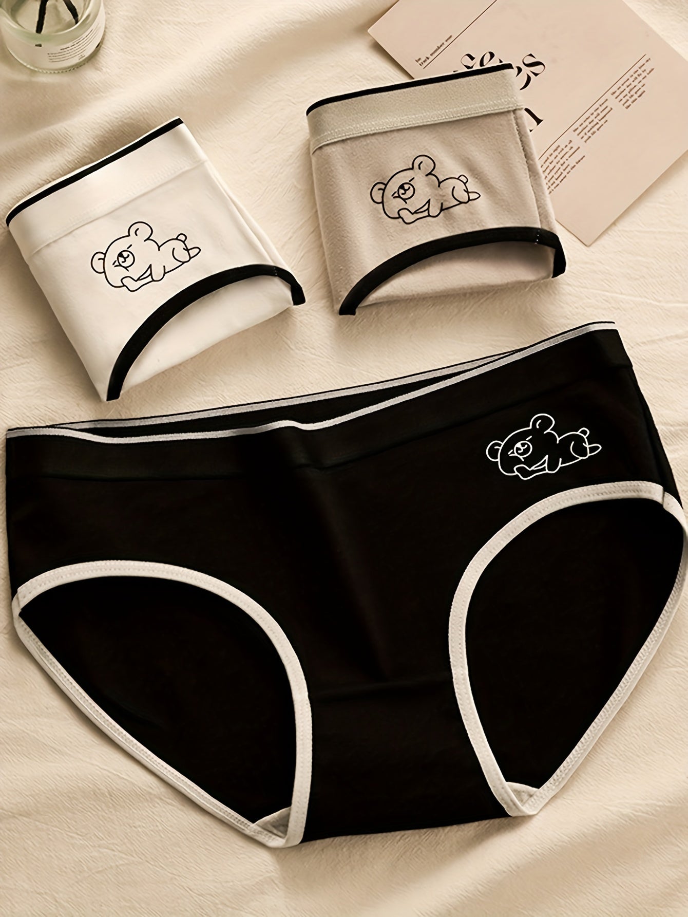 Women's 3-pack of cute cartoon bear briefs in a soft, breathable polyester blend.