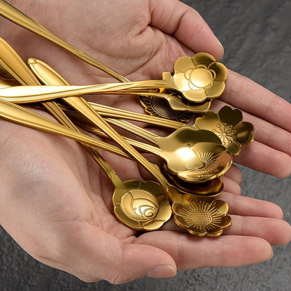 Golden stainless steel coffee and dessert spoons set with floral and geometric designs, ideal for tea, cake, and ice cream; great for weddings and coffee bars.