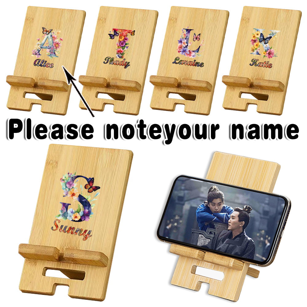 Personalized Wooden Cell Phone Stand with Custom Name - This detachable and universal phone holder is perfect for your desk or on the go. Made of wood, it features a convenient charging hole and can be customized with your name or a personalized DIY