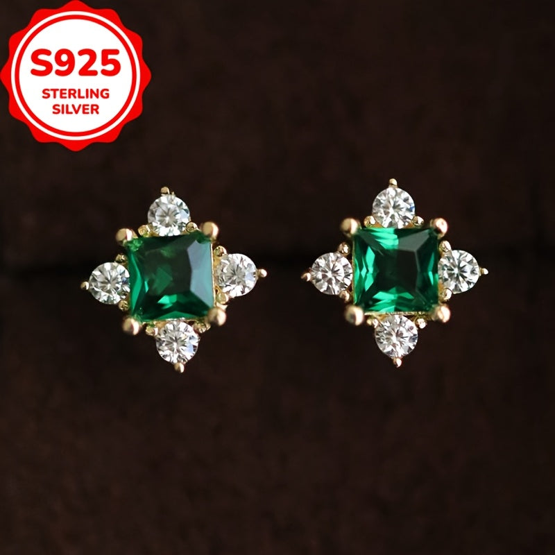 These elegant stud earrings are crafted from 925 sterling silver and feature synthetic zirconia stones. With a French vintage style and hypoallergenic screw backs, these earrings are perfect for daily wear or gifting. The celestial symbols theme and