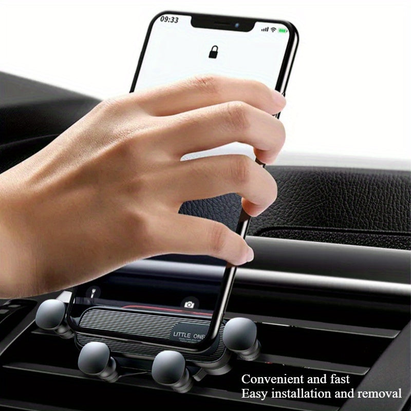 Universal adjustable car phone mount with invisible gravity design, non-electric, rectangular shape, plastic material, auto-clamping dashboard holder for smartphones.