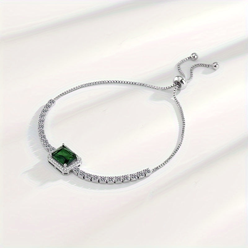 An elegant and luxurious women's bracelet featuring dazzling green Zirconia stones, crafted in adjustable 925 silver weighing just 4.3g. Perfect for daily wear, special occasions, and gifting, especially for Middle Eastern events.