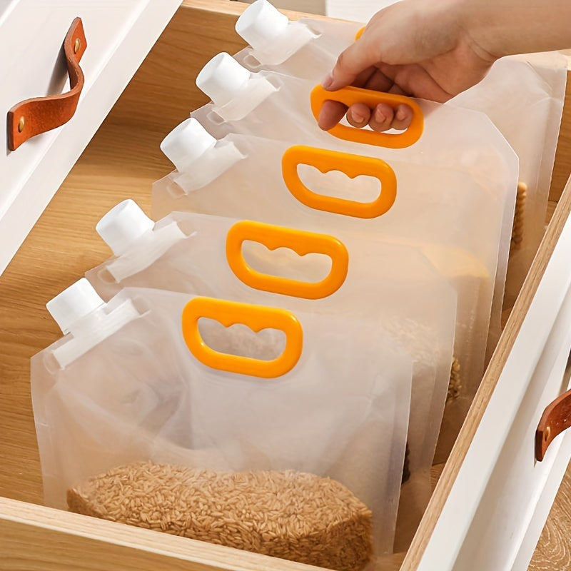 Three transparent cereal bags with lids for portable rice packaging and kitchen storage. These sealed bags are insect-proof and moisture-proof, ensuring freshness. Each bag can hold either 500g or 1000g of rice. Perfect for keeping your kitchen supplies